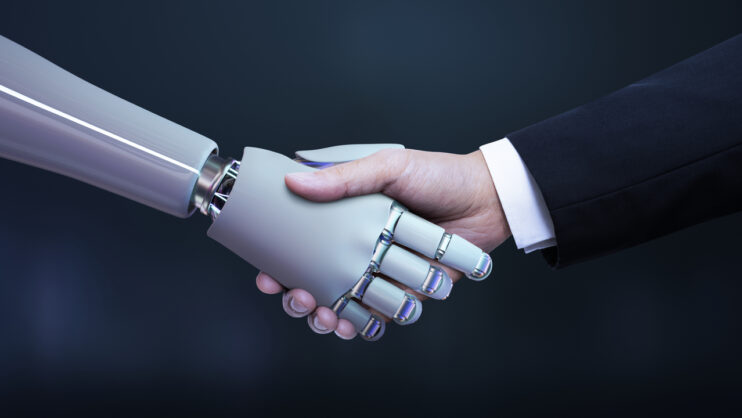 grafika uścisk dłoni ludzkiej i robota